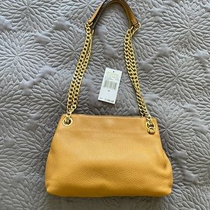 Michael Kors shoulder bag. Not too big/small. Can be used as crossbody bag.